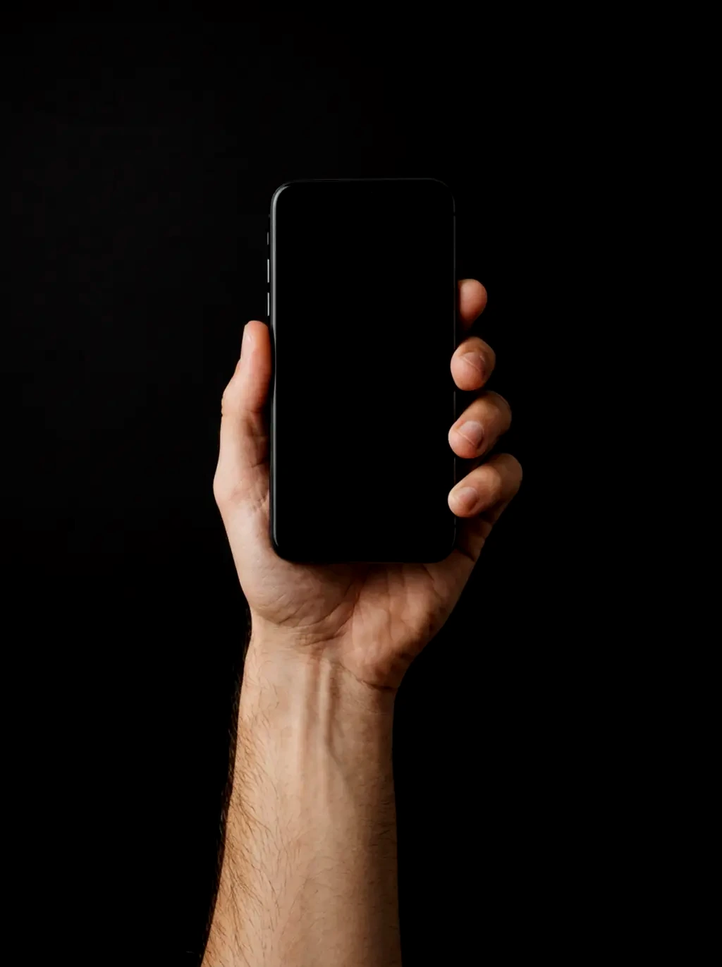 A hand holding a phone showing a conversation with Staira.